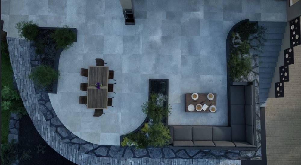 Plan de masse 3D vu du dessus d’une terrasse avec espace repas et brasero